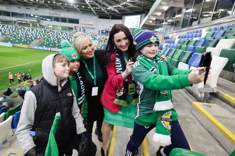 First Minister Michelle O'Neill and Deputy First Minister Emma Little-Pengelly with fans at Windsor Park during the recent visit to Northern Ireland's home stadium. Photograph: Kevin Boyes/Presseye/Inpho