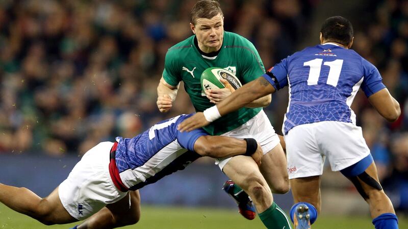 Brian O’Driscoll is tackled by Johnny Leota during Ireland’s clash with Samoa in 2013. Photograph: Dan Sheridan/Inpho