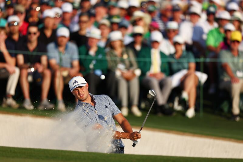 Ludvig Åberg of Sweden plays his shot from the bunker on the 18th hole during the final round of the Masters. Photograph: Maddie Meyer/Getty Images