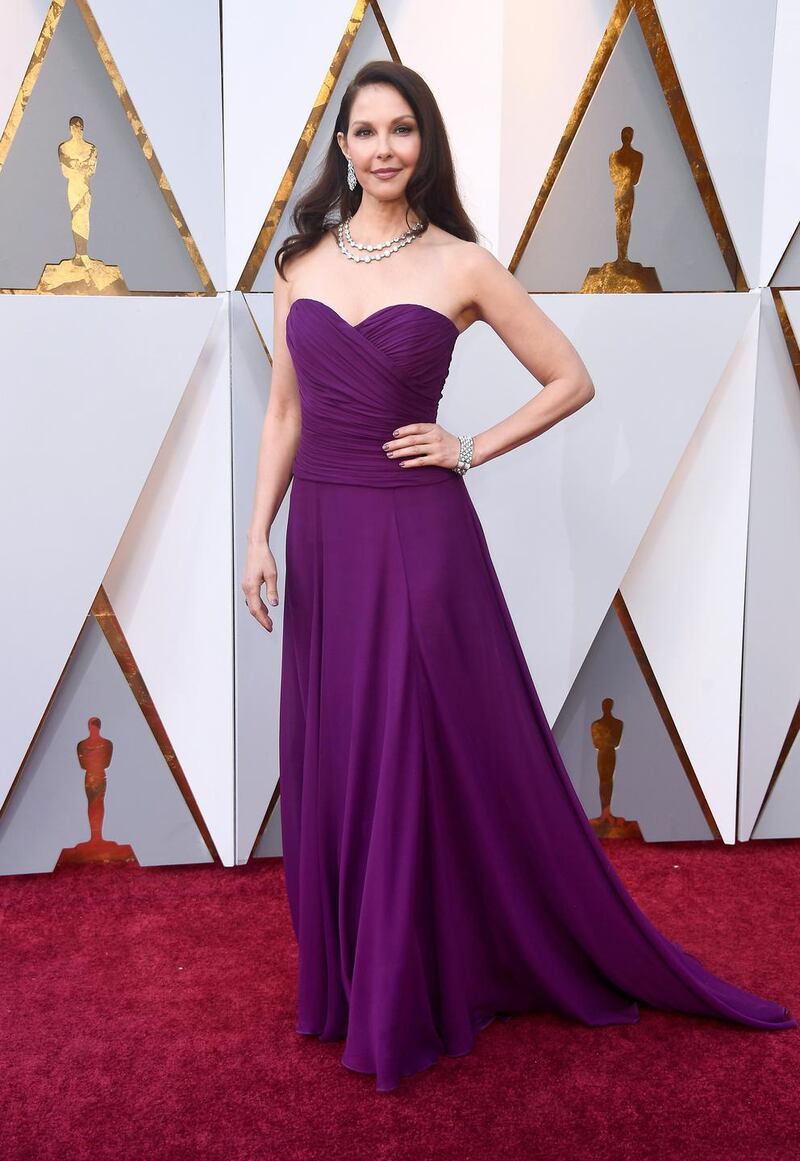 Ashley Judd chose a bright hue in a purple draped corseted gown by Badgley Mischka.