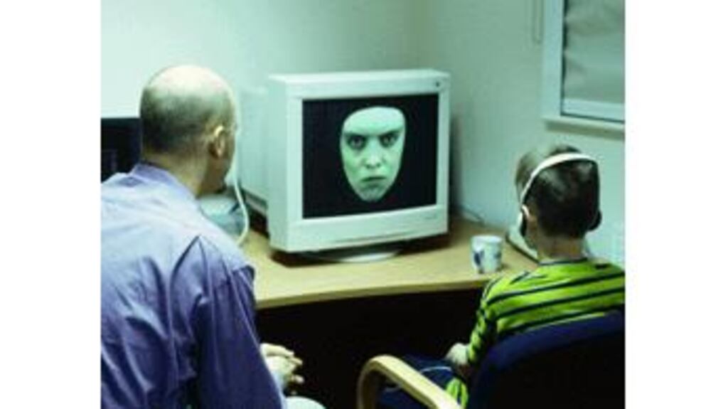 Tough tests: A researcher assesses the social emotional
processing skills of a boy with autism. Photograph: Annabella
Bluesky/Science Photo Library