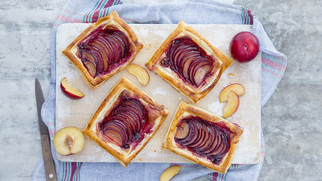 Plums in puff pastry. Photograph: Harry Weir Photography