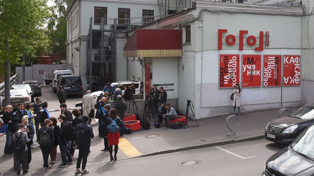 Journalists gather outside the Gogol Centre theatre in Moscow after it was raided by police. Photograph: Vasily Maximov/AFP/Getty Images