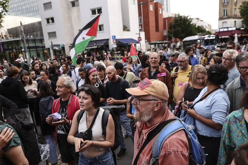 People participate in a spontaneous rally following the rejection of the vote of confidence requested by former prime minister François Bayou, in Montreuil, Paris, on Monday. Photograph: EPA