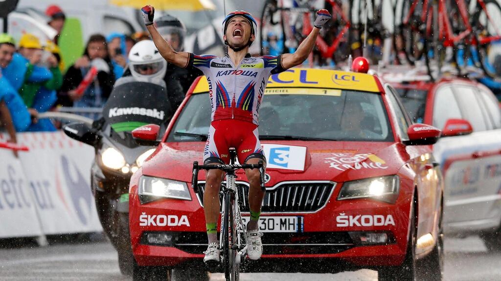 Team Katusha rider Joaquim Rodriguez of Spain reacts as he crosses the finish line to win the 12th stage of the 102nd edition of the Tour de France 2015 cycling race over 195 km between Lannemezan and Plateau de Beille. Photo: Kim Ludbrook/PA