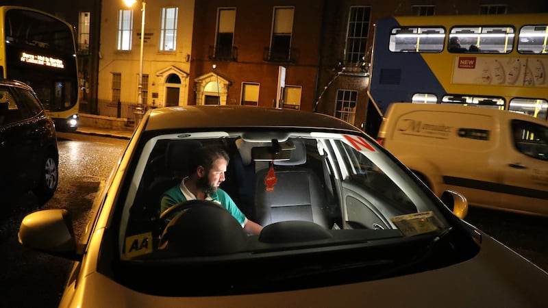 Steven Harris waiting outside the Rotunda hospital for his wife, Marian, who is two days shy of her due date. Photograph: Nick Bradshaw/The Irish Times