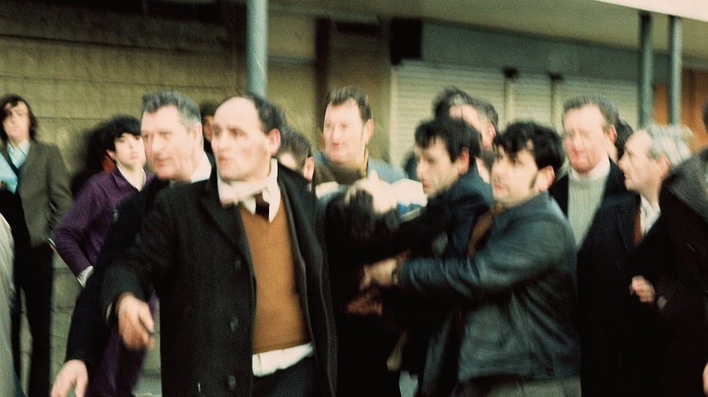 A civilian, shot and wounded by British paratroopers, is rushed to a waiting ambulance. Soldiers opened fire on the civil rights march, killing 14 on what became known as Bloody Sunday. Photograph: William L. Rukeyser/Getty Images