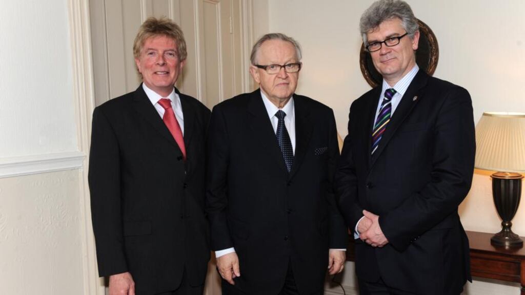 Former president of Finland and Nobel Peace Prize winner Martti Ahtisaari (centre) with Prof Hastings Donnan and Prof Tony Gallagher at the launch of the Institute for Study of Conflict Transformation and Social Justice at Queen’s University Belfast yesterday. Photograph: Stephen Hamilton/Presseye