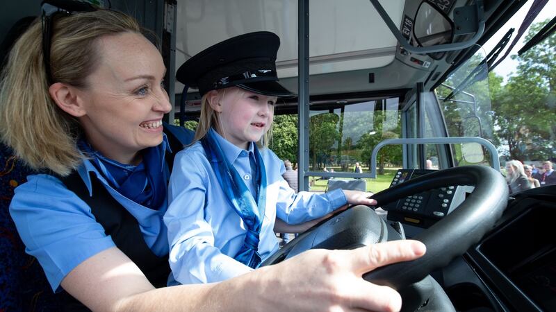 Naoise O Molloy (5) from Trim, Co Meath, with Dublin Bus driver Suzanne Armstrong at the launch of the new recruitment campaign. Photograph: Tom Honan/The Irish Times.