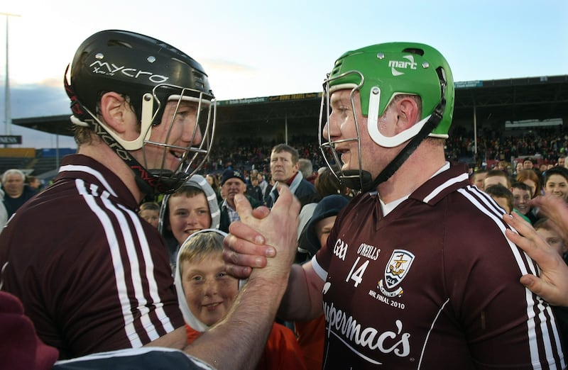 Galway's Tony Óg Regan and Joe Canning celebrate at the final whistle of the League Division 1 final in May 2010. Photograph: Cathal Noonan/Inpho