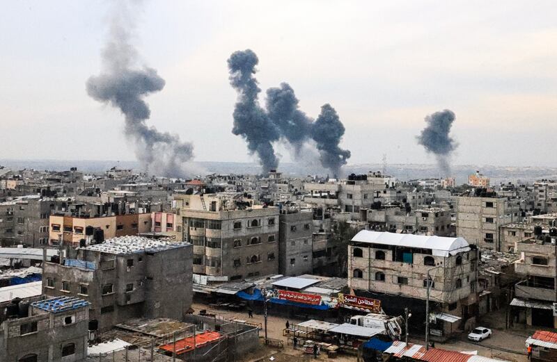 Smoke billows above Gaza after Israeli strikes over the Nuseirat refugee camp on Wednesday. Photograph: Mahmud Hams/AFP via Getty