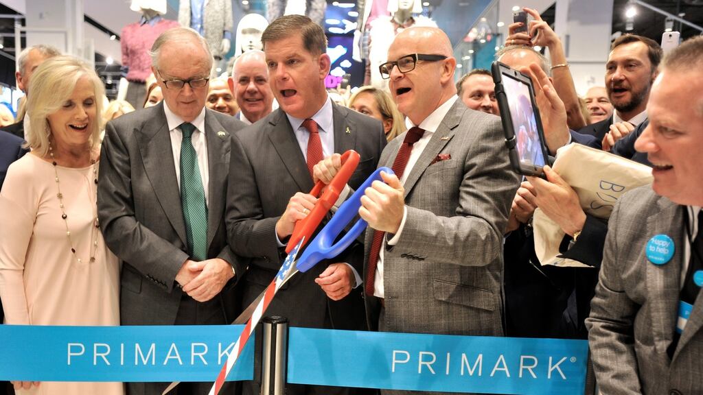 Mayor Martin Walsh of Boston Center and chief executive Paul Marchant cut a ceremonial ribbon watched by Alma Ryan and husband Arthur Ryan, founder of Penney’s, at the opening of the first Primark store in the US. Photograph: Josh Reynolds