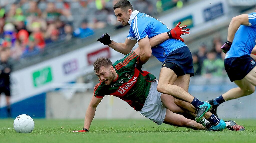 Aidan O’Shea of Mayo with James McCarthy of Dublin during the All-Ireland Senior Football Championship final at Croke Park. Photo: Donall Farmer/Inpho