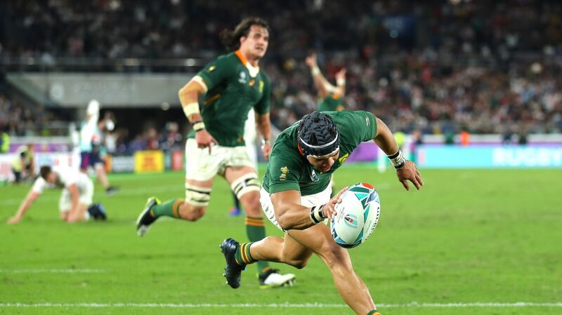 Cheslin Kolbe scores his side’s second try against England. Photograph: Shaun Botterill/Getty