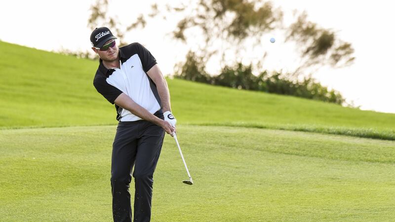 McInerney chips a shot to the 18th hole green of the Panther Lake Course during the third round of Web.com Tour Q-School last year. Photo: Keyur Khamar/PGA TOUR