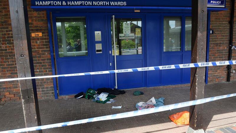 A police cordon at Hampton Police station in Hampton, west London after a man in his 60s was arrested on suspicion of attempted murder after four women were stabbed at about 10.35am on Friday. Photograph: Stefan Rousseau/PA Wire