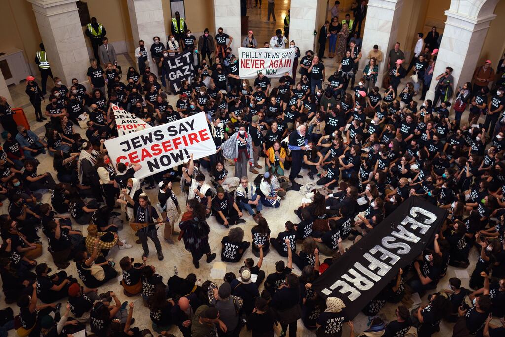Protestors from the campaign group Jewish Voice for Peace stage a protest inside the Cannon Building of the US Capitol in Washington DC, United States, on Wednesday. Photographer: Will Oliver/EPA