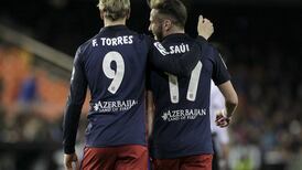 More woe for Nevilles as Atletico too good for Valencia