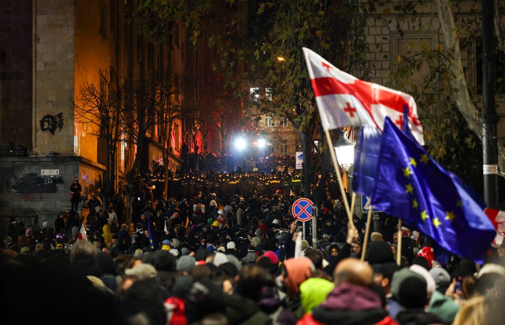 Police forces are  deployed outside the parliament building as protesters rally for the fifth straight night  in central Tbilisi. Photograph: Giorgi Arejvanidze/ AFP via Getty Images