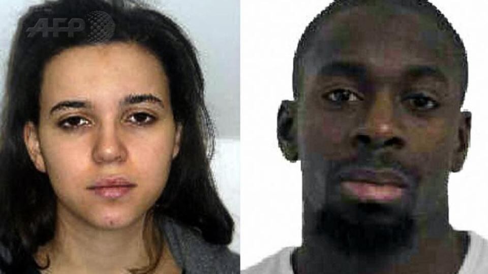 Images released by French police of two suspects sought in connection with the killing of a police woman in Paris on Thursday. Hayat Boumeddiene (left) and Amedy Coulibaly (right).