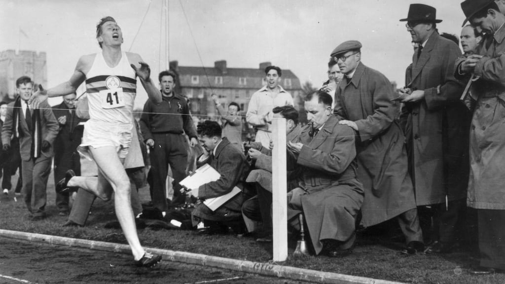 Roger Bannister about to cross the tape at the end of his record breaking mile run at Iffley Road, Oxford. He was the first person to run the mile in under four minutes, with a time of 3 minutes 59.4 seconds. Photograph: Norman Potter/Central Press/Getty Images