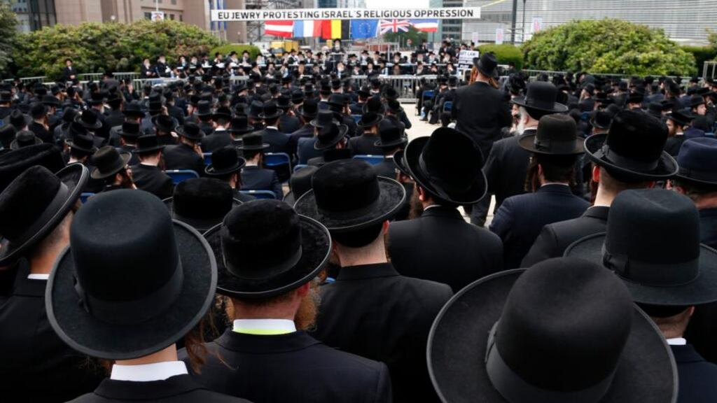 Orthodox Jews gather outside the European Union Council building in Brussels during a protest. Discussions have been ongoing  in Israel as to whether Orthodox rabbis should set standards for all Jews. Photograph: Francois Lenoir/Reuters