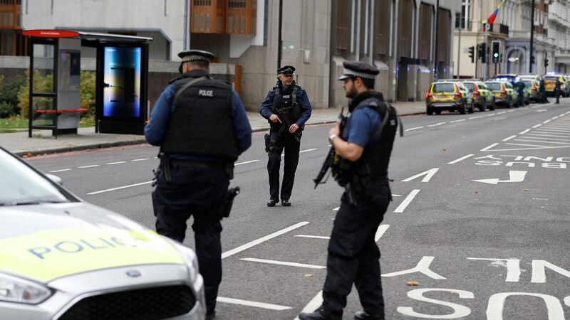 Police officers stand in the road near the Natural History Museum, after a car mounted the pavement injuring a number of pedestrians in London. Photograph: REUTERS/Peter Nicholls