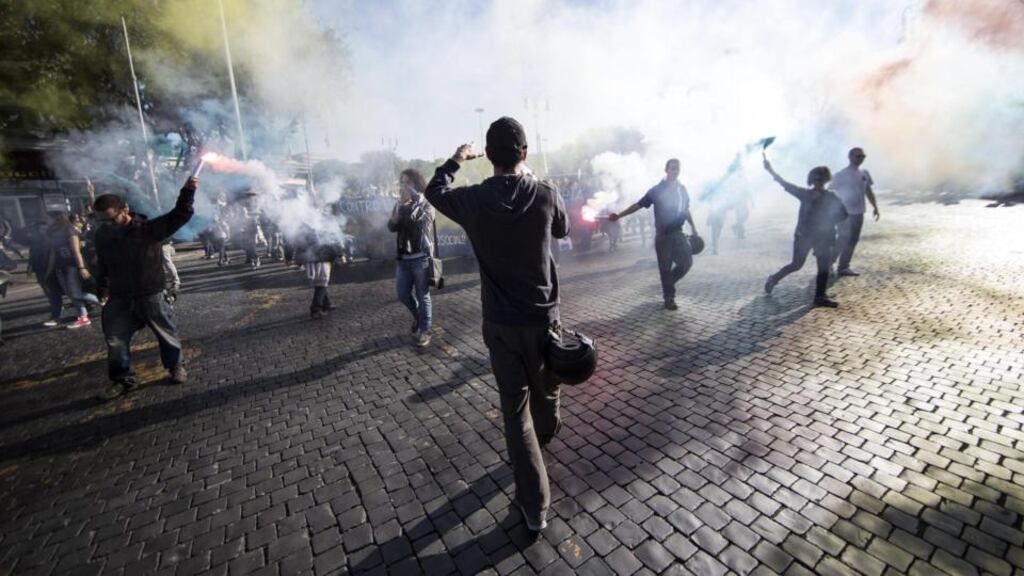 Eggs and fireworks were thrown at the Italian economy ministry in Rome during street protests at the weekend. Photograph: EPA/Massimo Percossi