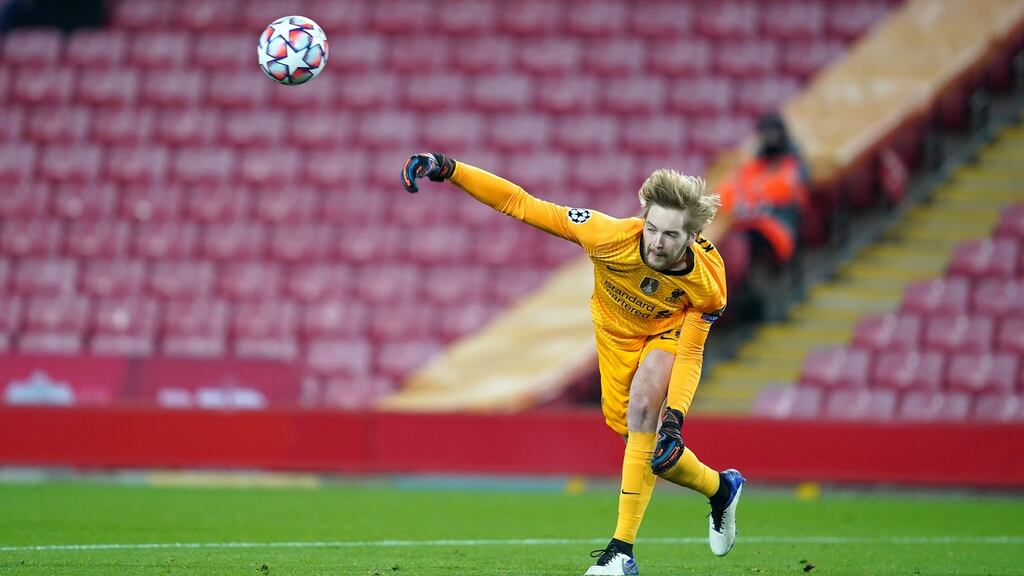 Liverpool goalkeeper Caoimhin Kelleher throws the ball out during the Uefa Champions League win over Ajax. Photo: EPA