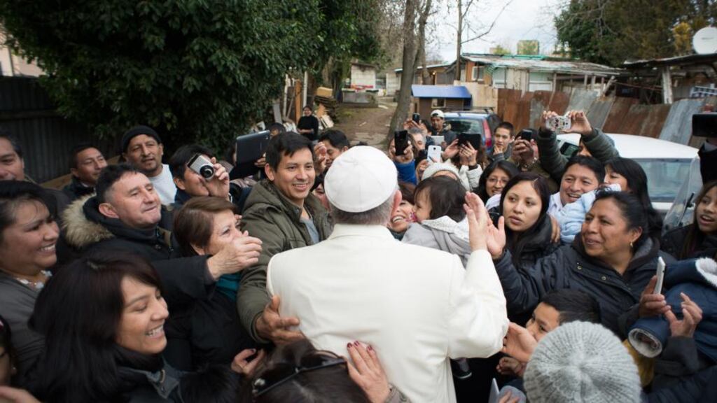 Pope Francis during a visit to a refugee camp this week in Rome. Photograph:  Osservatore Romano/AFP/Getty Images