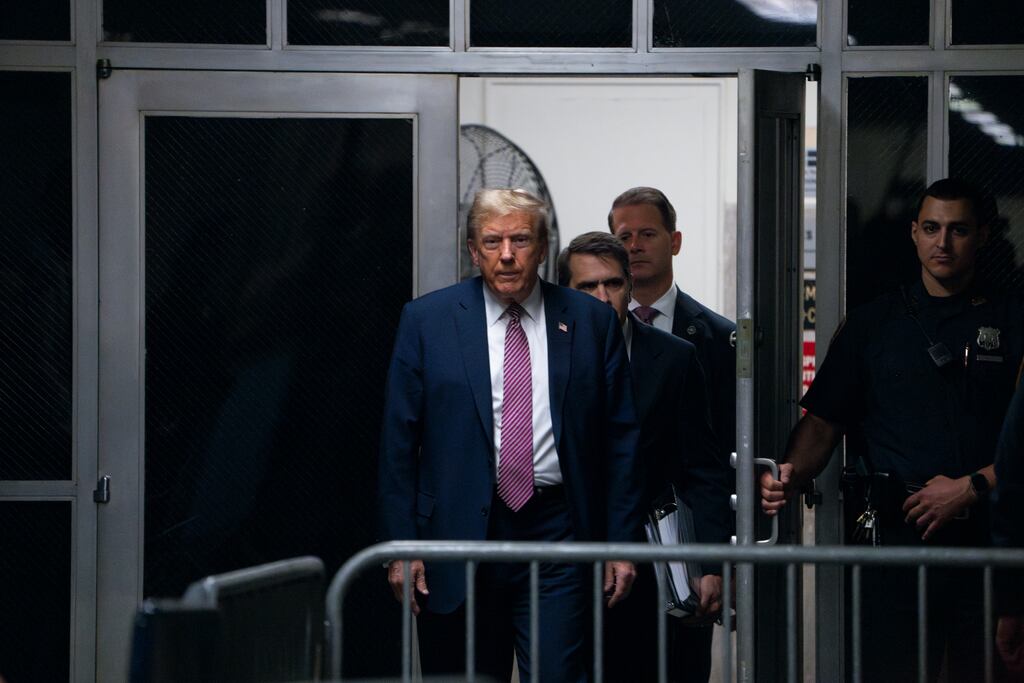 Former president Donald Trump arrives outside the courtroom for his criminal trial at Manhattan Criminal Court in Manhattan. Photograph: Maansi Srivastava/The New York Times