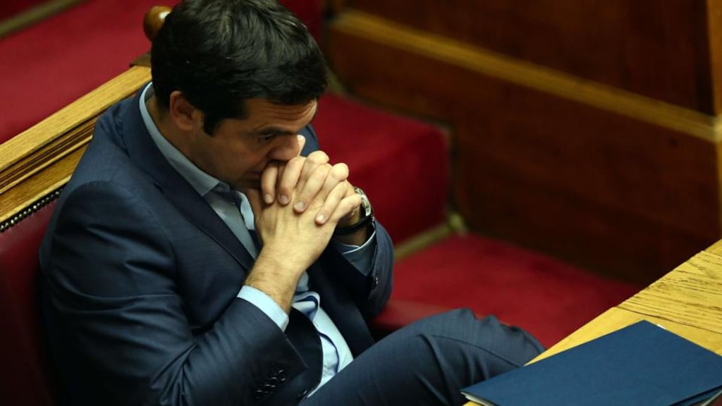 Greek prime minister Alexis Tsipras listen to speakers during a session at the Greek parliament. Photograph: AFP/Getty Images