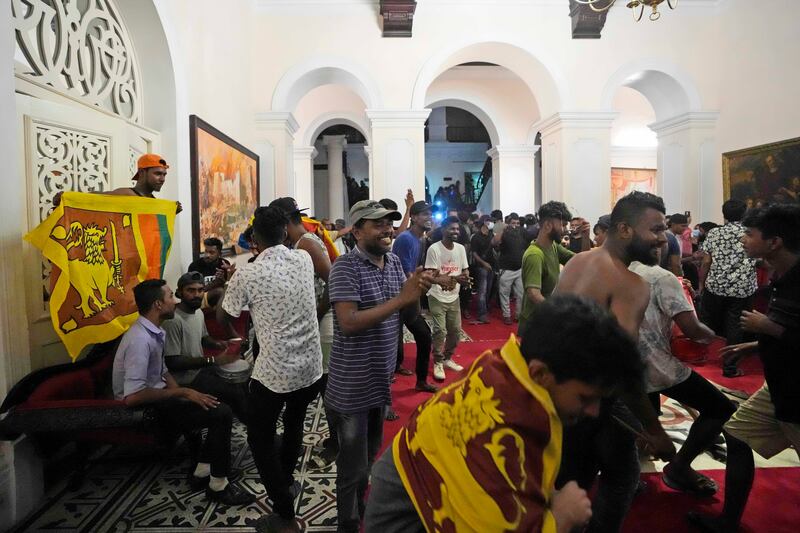 Protesters sang and danced inside the residence. Photograph: Eranga Jayawardena/AP