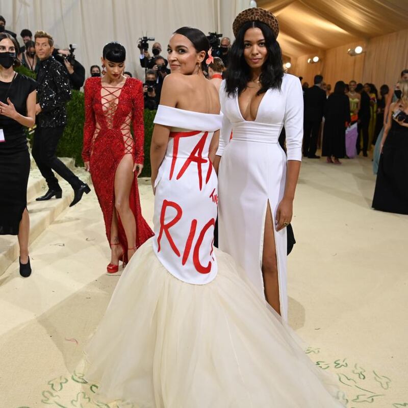 Representative Alexandria Ocasio-Cortez of New York sent a message with her gown by Aurora James. The back of her dress was emblazoned with the words Tax the Rich in red