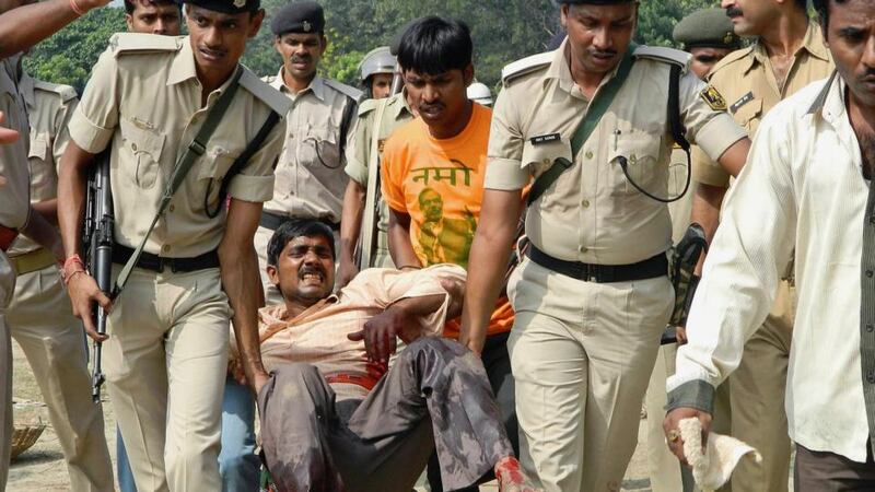 Campaigning for India’s tight national election turned violent when a series of blasts ahead of opposition candidate Narendra Modi’s rally in an eastern Indian city left five people dead and 83 wounded. Photograph: Krishna Murari Kishan/Reuters