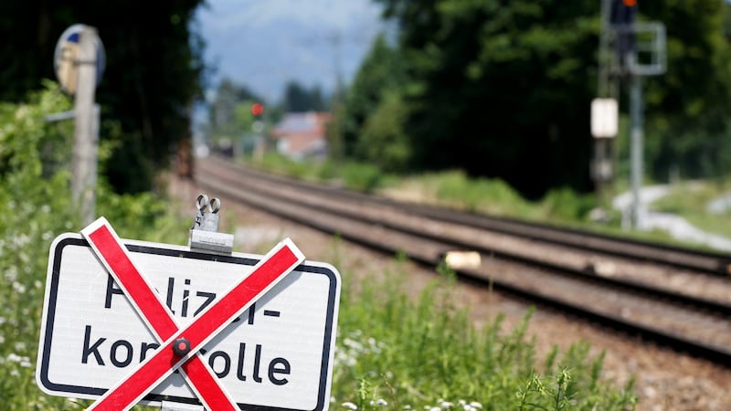 A traffic sign ‘Police checkpoint’ is seen between Kiefersfelden and the Austrian city Kufstein. Photograph: Reuters/ Michaela Rehle