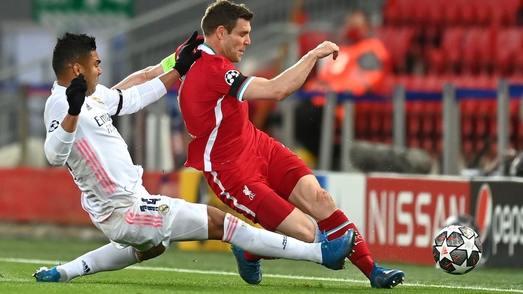 James Milner of Liverpool is fouled by Casemiro of Real Madrid during the Champions League quarter-final, second leg at Anfield. Photograph: Michael Regan/Getty Images