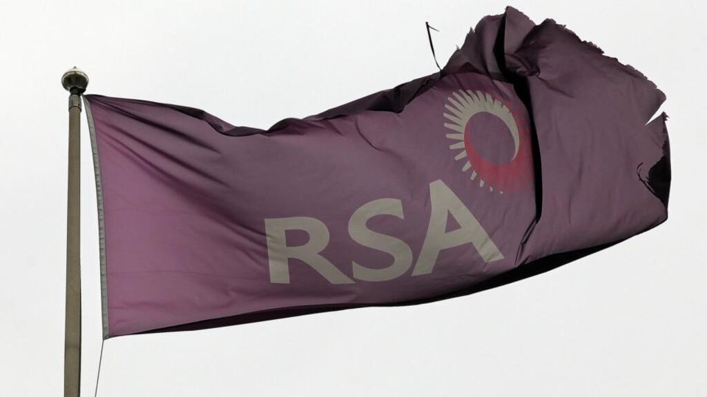 The company logo for RSA Insurance Group Plc is seen on a flag outside the company headquarters in London. Photographer: Simon Dawson/Bloomberg