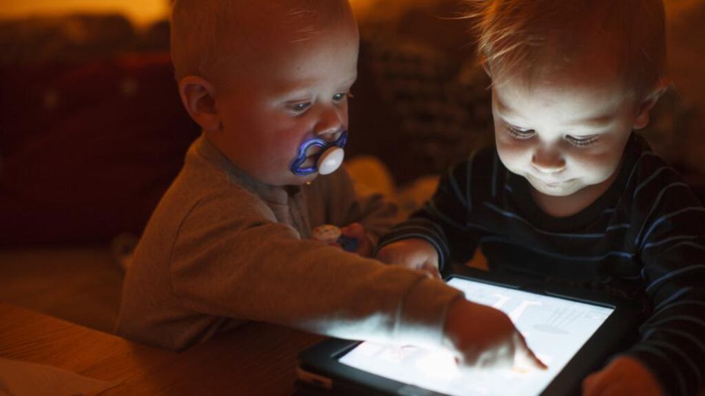 Kids these days: with high levels of digital usage within families, there can be problems defining non-digital time. Photograph: Anders Andersson/Getty