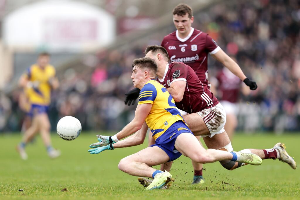 Roscommon's Daire Gregg and Cillian McDaid of Galway. Photograph: Laszlo Geczo/Inpho