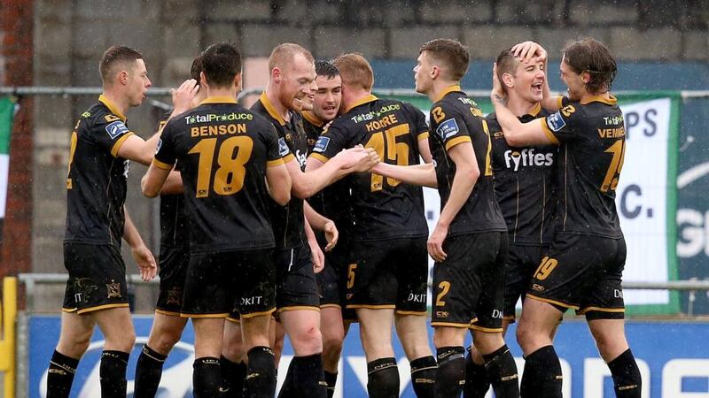 Dundalk’s Patrick McEleney celebrates scoring his side’s second goal with teammates. Photograph: Tommy Dickson/Inpho
