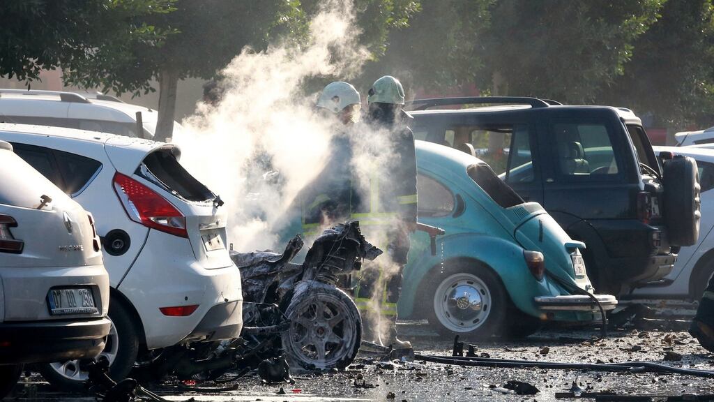Firefighters extinguish a fire at the site of a blast in the Mediterranean resort city of Antalya, Turkey on Tuesday. Photograph: Reuters/Stringer