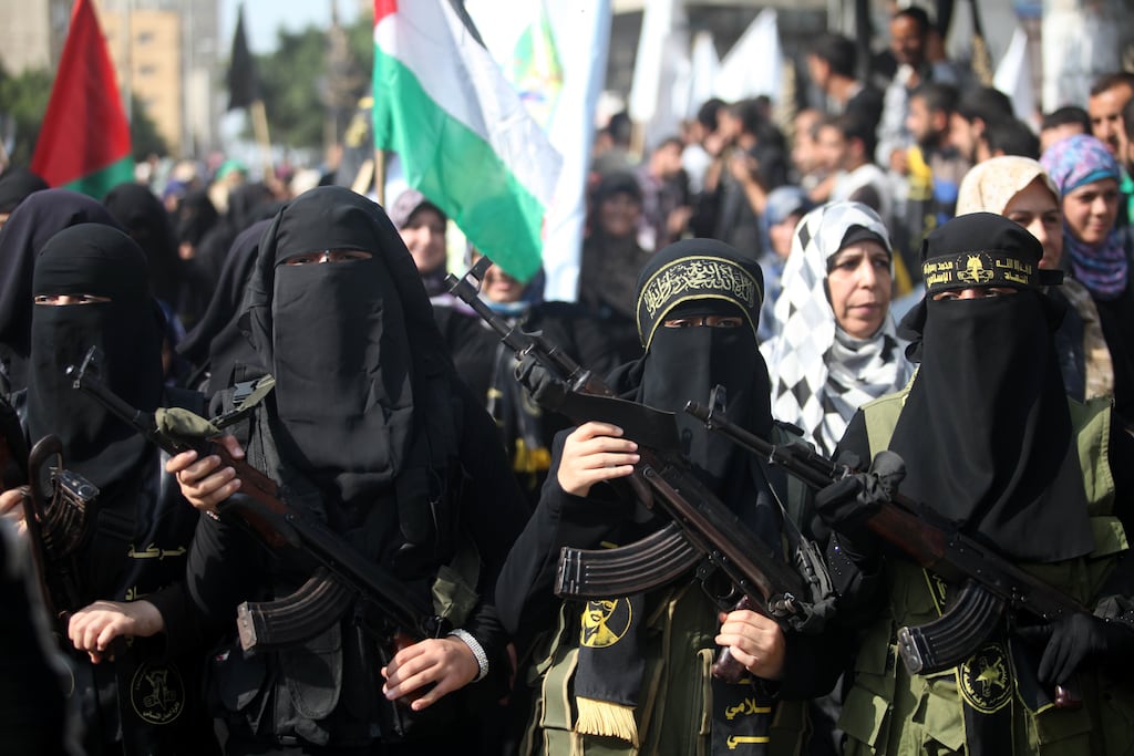 Supporters of Palestinian Islamic Jihad attend a rally marking the 26th anniversary of the movement's foundation and the 18th anniversary of the death of the group's leader, Fathi Abd al-Aziz al-Shikaki, in Gaza City in November 2013. Photograph: Majdi Fathi/NurPhoto/Corbis via Getty Images