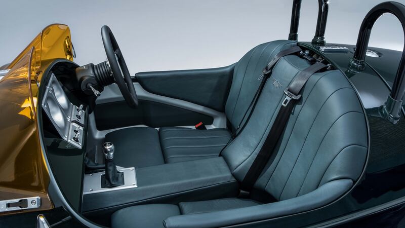 Inside, there are seats for two and those seats are fixed in place – the steering wheel and pedals move to allow you to adjust the driving position. Photograph: Nick Dimbleby