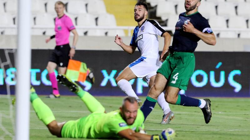 Apollon’s Adrian Sardinero scores the winning goal past Rovers’ goalkeeper Alan Mannus. Photograph: Chara Savvides/Inpho