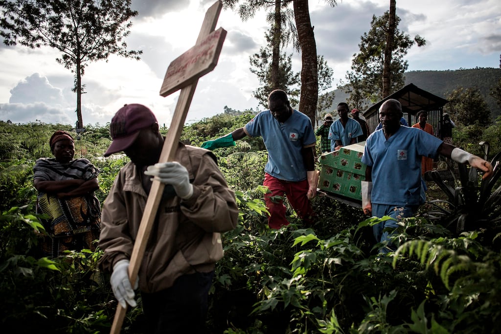 Health workers carry a coffin containing a victim of Ebola virus in the city of Butembo in the Democratic Republic of Congo. Photograph: John Wessels/AFP