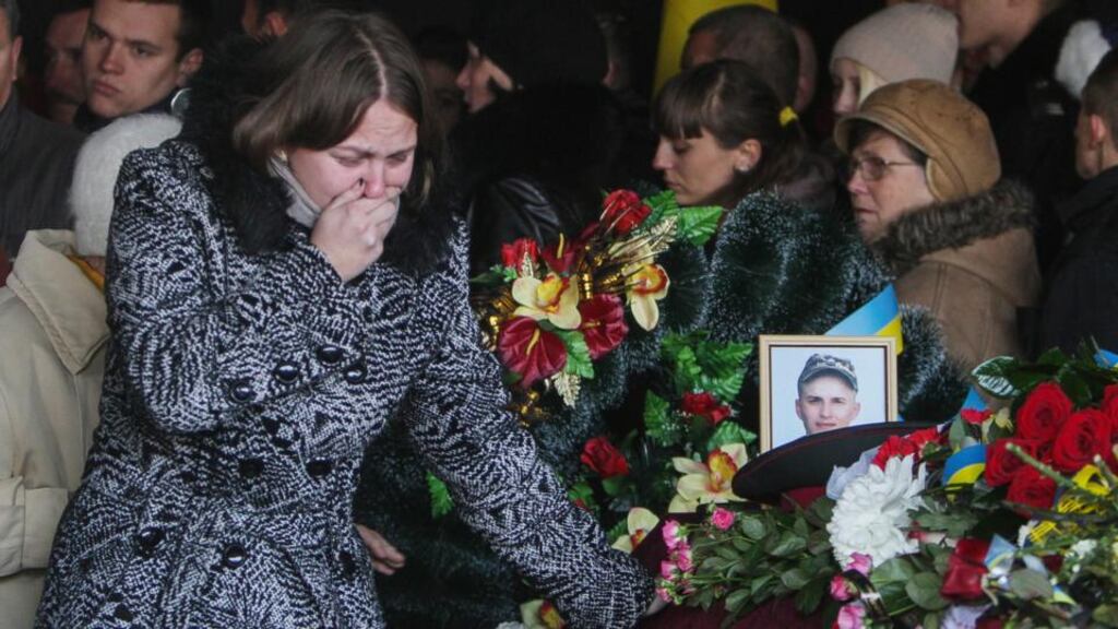 The funeral of Igor Rozlutskiy, a Ukrainian soldier who was killed fighting in Donetsk region, eastern Ukraine. Photograph:  EPA/Photomig