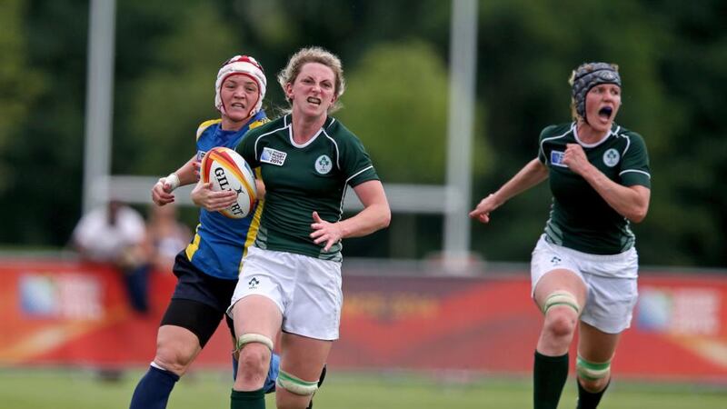 Ireland’s Siobhan Fleming goes clear for her try. Photograph: Dan Sheridan/Inpho