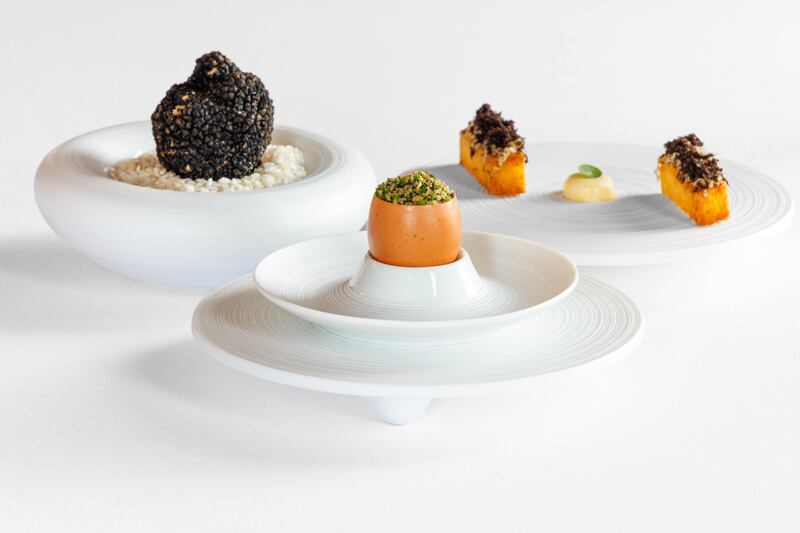 Soft egg, warm potato, chicken skin and black truffle, served with buttermilk brioche soldiers and roast chicken butter, at Keith Boyle at Bridge House. Photograph: Dylan Vaughan