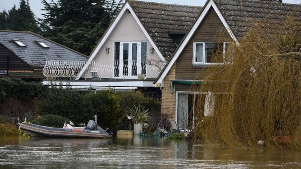 Flooded homes amidst rising flood waters in Old Windsor, 32km west of London, on Tuesday. Chemical toilets have been sent to residents of the area. Photograph: Andy Rain/EPA